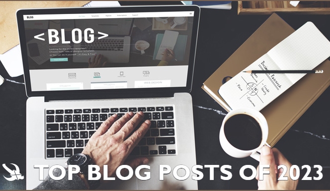 man's hand on computer on desk with text Top Blog Posts of 2023